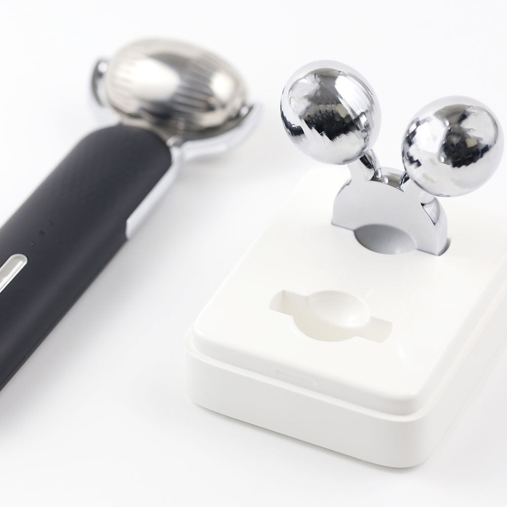 EMS V-Roller head securely placed in its re-nū storage case, with the Cryo Roller attachment positioned beside it.