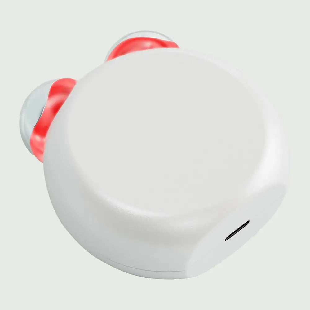 Back angled view of the compact LED Facial Toning Massager, displayed with its charging port, highlighting its rechargeable, cordless design for convenience.
