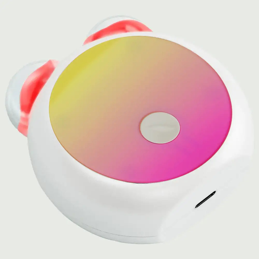 Top angled view of the compact LED Facial Toning Massager, front view showing the smooth, ergonomic design with visible LED light High Frequency Microcurrent EMS massage rollers.