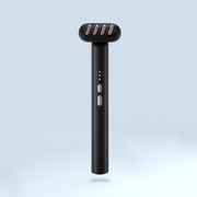 A black electric shaver featuring red blades, designed for precision grooming and enhanced with Mask LED Light Therapy.