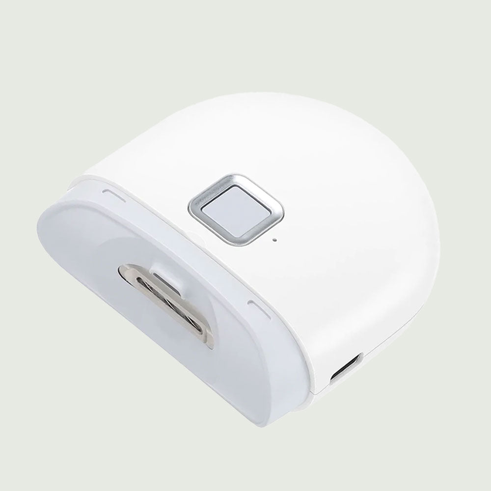 Electric Nail Trimmer with curved ergonomic design, safety blade head, and sleek white finish