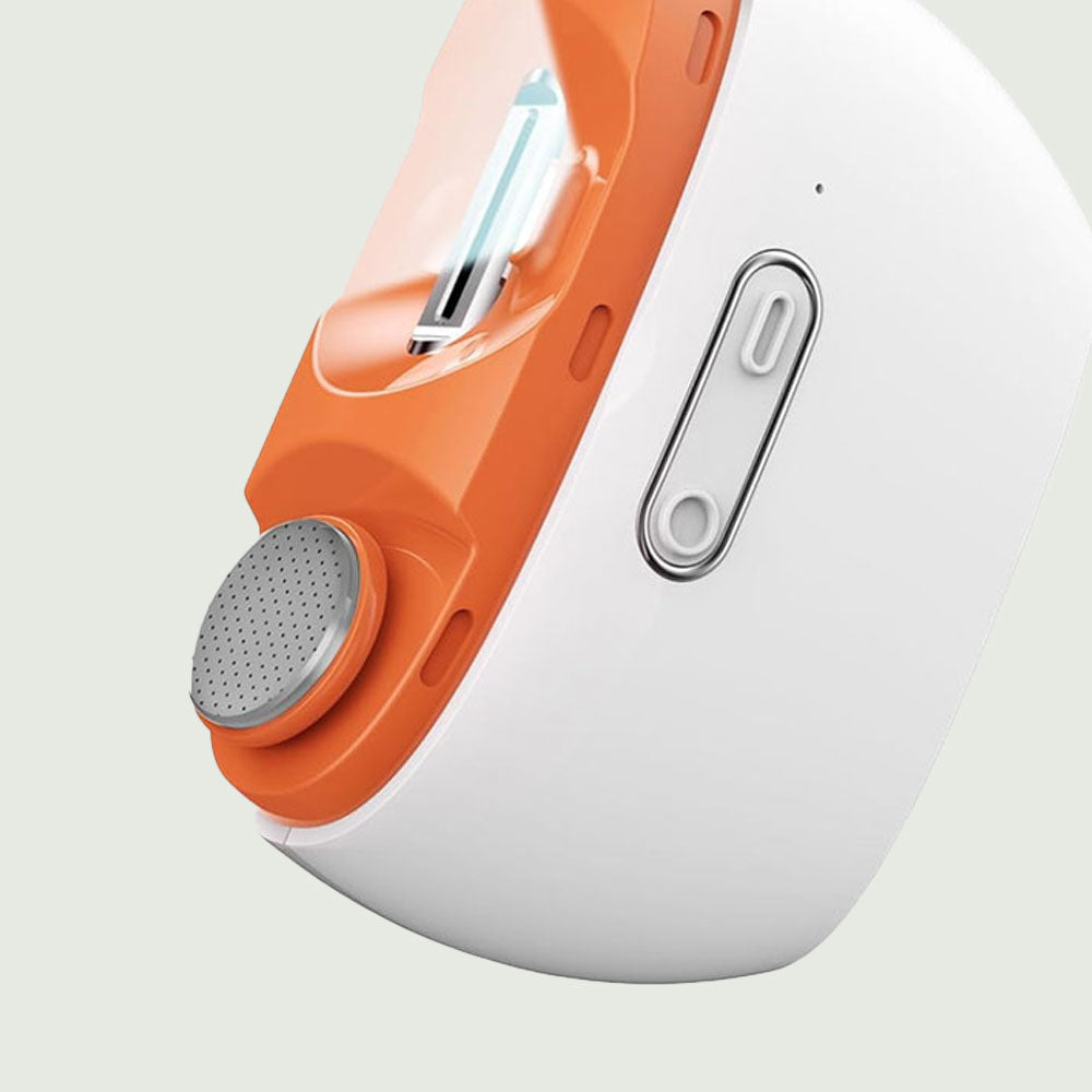 Closeup view of the precision trimming head on the electric nail trimmer with polisher light, showing easy to use controls and ergonomic design.