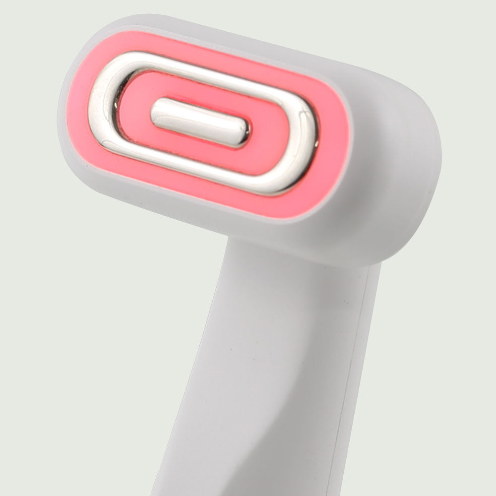 Close-up view of the GlowUp 360° LED light therapy wand with ergonomic design and charging base, ideal for facial skin rejuvenation and anti-aging treatment.