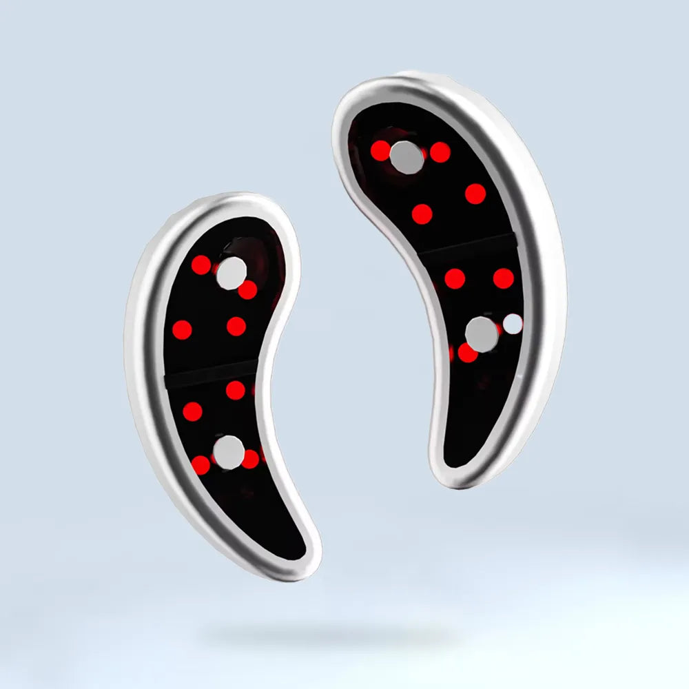 Pair of GlowUp Anti-Aging Eye Pads in sleek black and red design, designed to firm, lift, and brighten the under-eye area with targeted LED light therapy.


