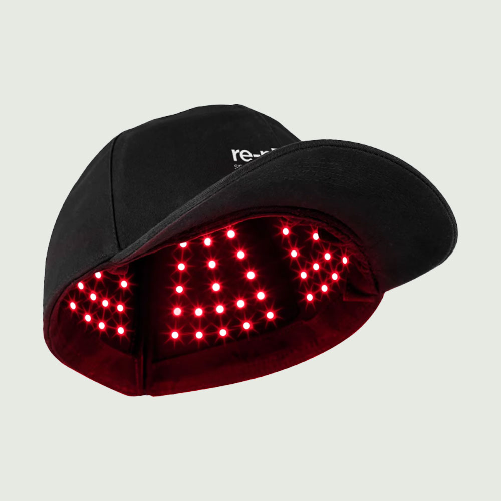 re-nū Smart Beauty LED red light therapy cap with built-in diodes for hair growth, regrowth, and scalp stimulation using 660nm and 850nm wavelengths

