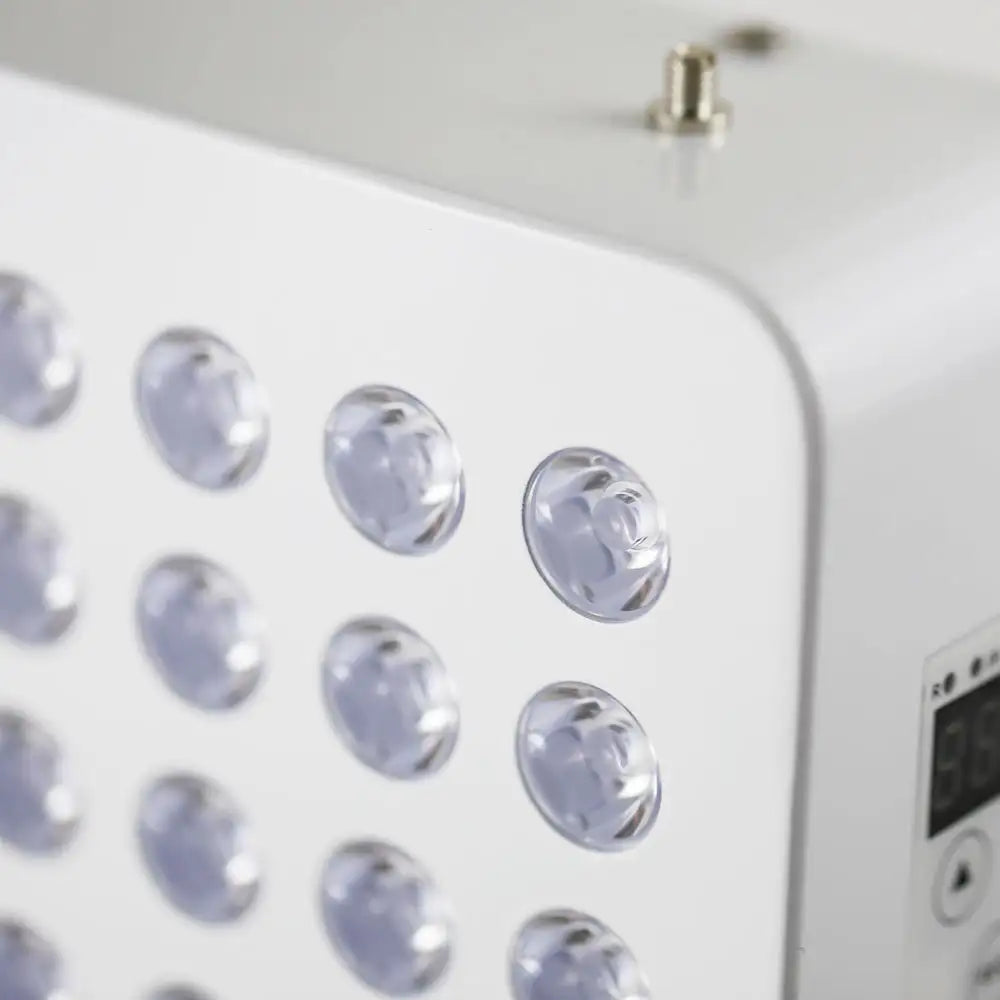 Closeup view of the Red Light Therapy Panel Pro on its adjustable stand, showing the full LED panel and light diodes.