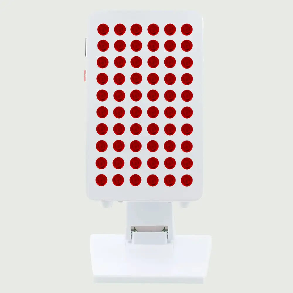 Front view of the Red Light Therapy Panel Pro on its adjustable stand, showing the full LED panel with illuminated red and near-infrared lights.