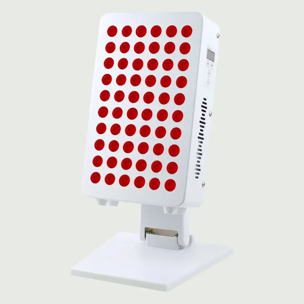 Angled view of the Red Light Therapy Panel Pro on its adjustable stand, showing the full LED panel with illuminated red and near-infrared lights.