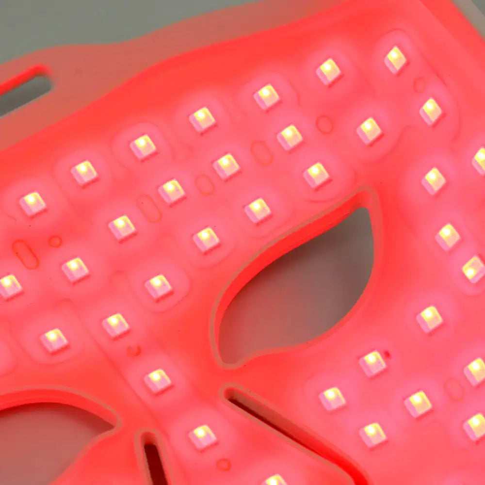 Close-up of LED arrays inside the re-nū Liquid Silicone LED Mask glowing vivid red