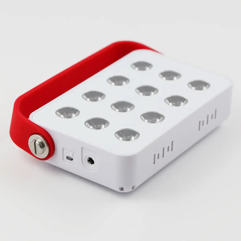 Mini LED Red Light Panel placed on a flat surface in a clean, minimal setting