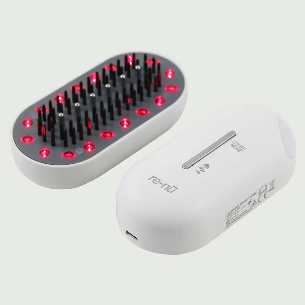 Plasma Laser Therapy Hair Growth Comb by re-nū Smart Beauty – close-up showing red laser diodes and microcurrent comb teeth