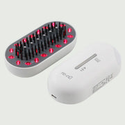 Plasma Laser Therapy Hair Growth Comb by re-nū Smart Beauty – close-up showing red laser diodes and microcurrent comb teeth
