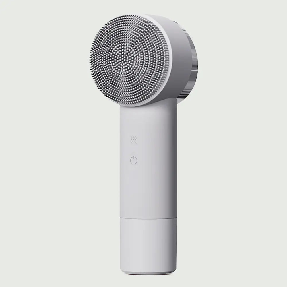 PurePulse Elite Sonic Brush with Heat by re-nū  sleek skincare device with medical-grade silicone bristles, featuring warming tip for deep pore cleansing and daily glow enhancement.






PurePulse Elite Sonic Brush with Heat by re-nū  sleek skincare device in rose gold with medical-grade silicone bristles, featuring warming tip for deep pore cleansing and daily glow enhancement






