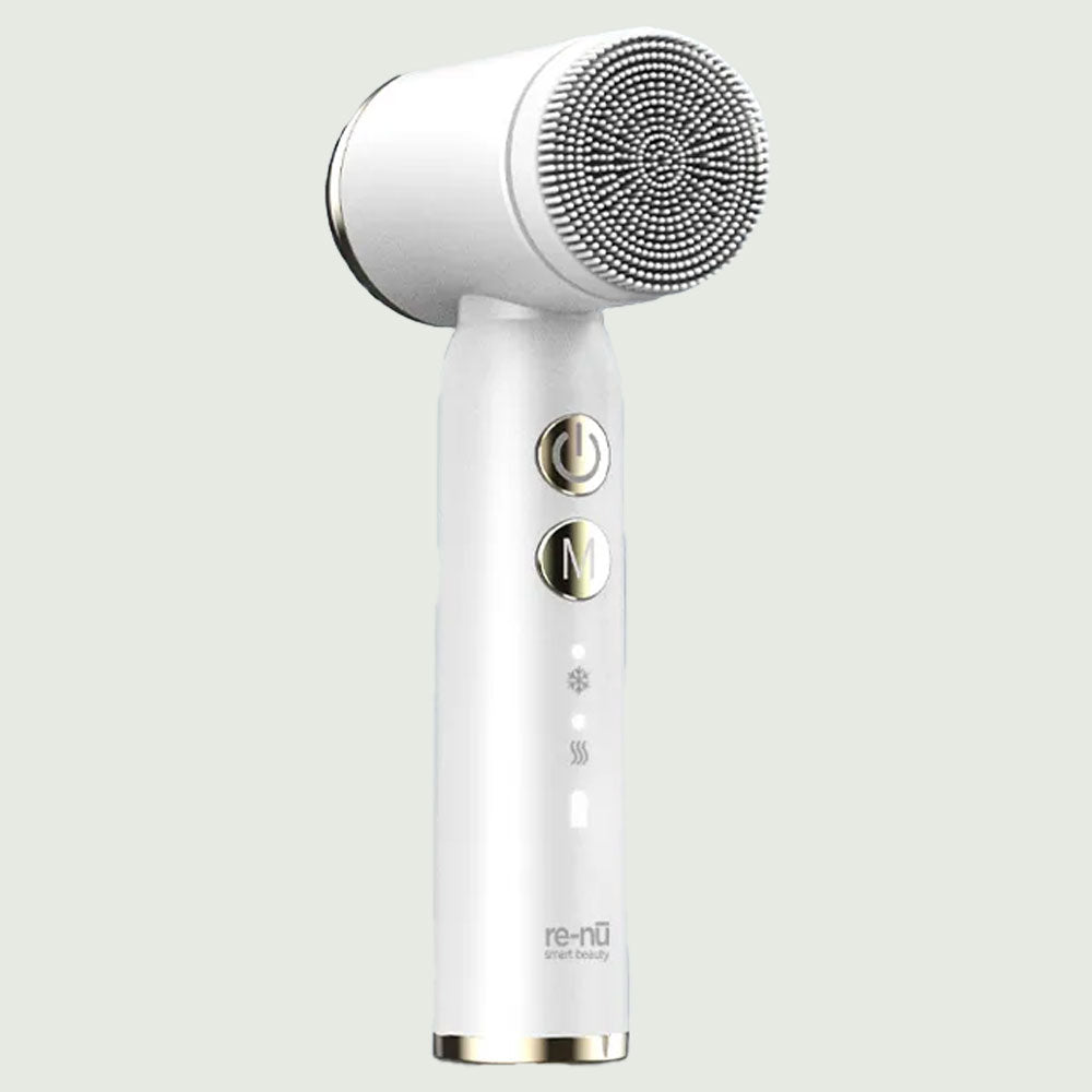 PureSpin Multi-Function Cleansing Brush with detachable brush heads on display