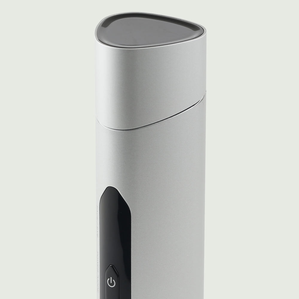Close-up of the re-nū RF LED Microcurrent Face-Lifting Device with the lid securely placed over the treatment head, highlighting its protective and hygienic design.