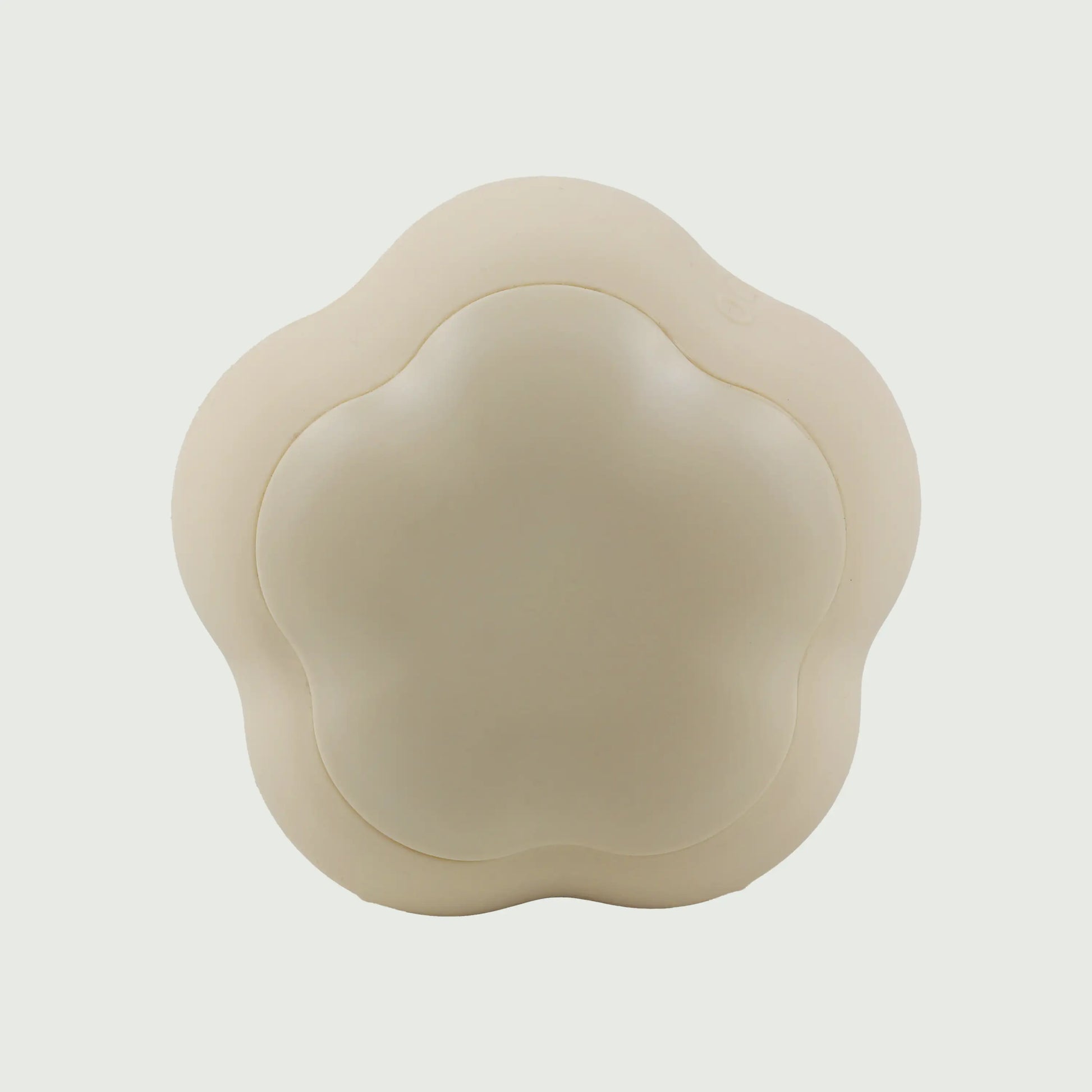 Back view of the Rotating Sonic Cleansing Brush, showcasing the smooth ergonomic finish and compact rechargeable design.