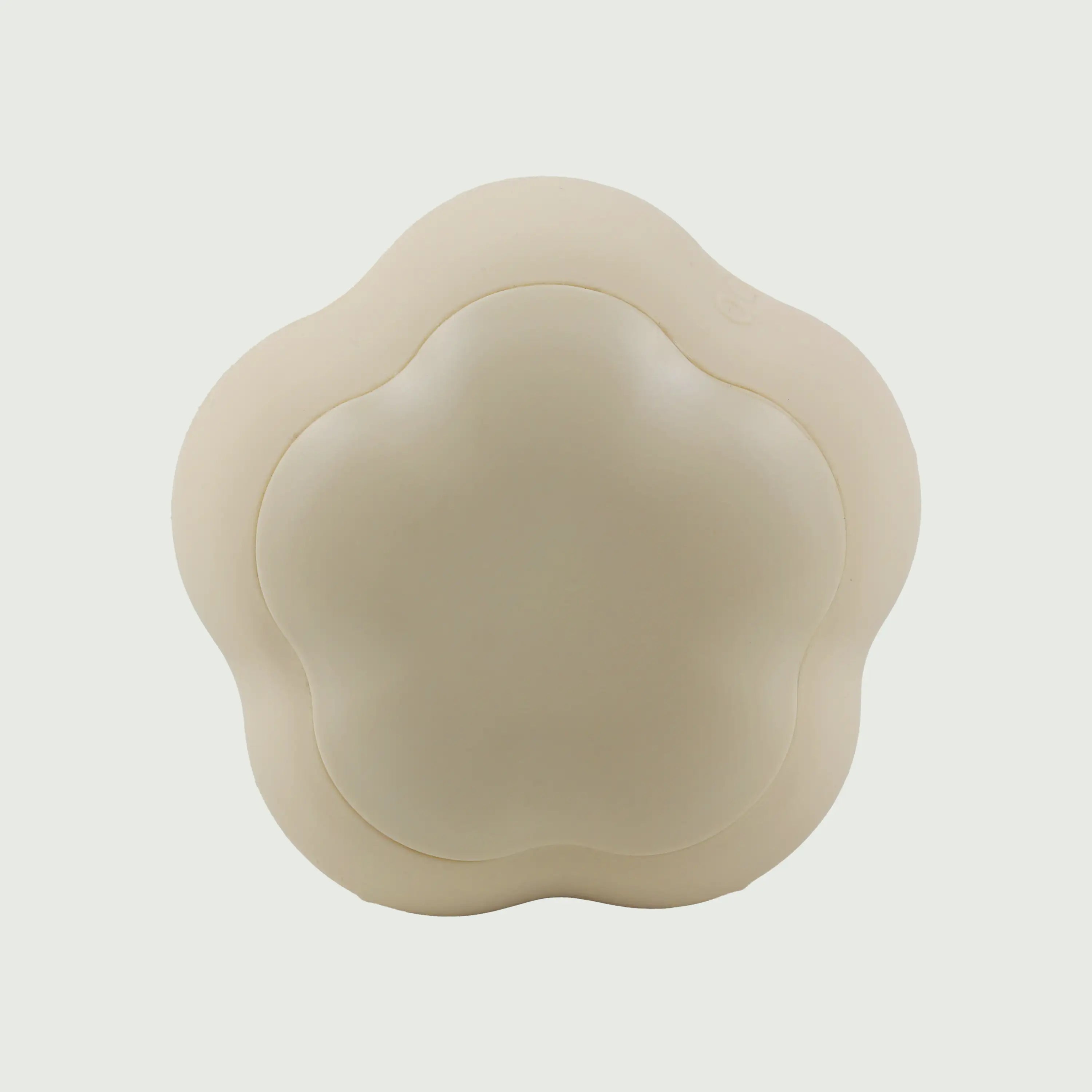 Back view of the Rotating Sonic Cleansing Brush, showcasing the smooth ergonomic finish and compact rechargeable design.