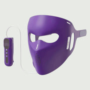 Side angle of soft silicone LED mask with remote, highlighting face coverage.