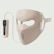 Side angle of soft silicone LED mask with remote, highlighting face coverage.