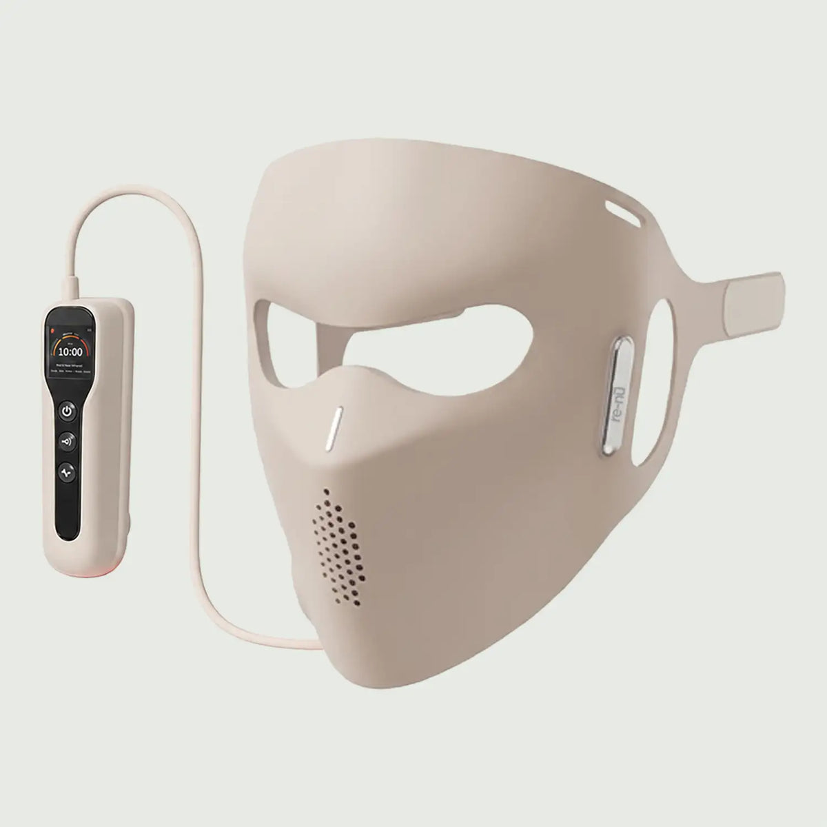 Side angle of soft silicone LED mask with remote, highlighting face coverage.
