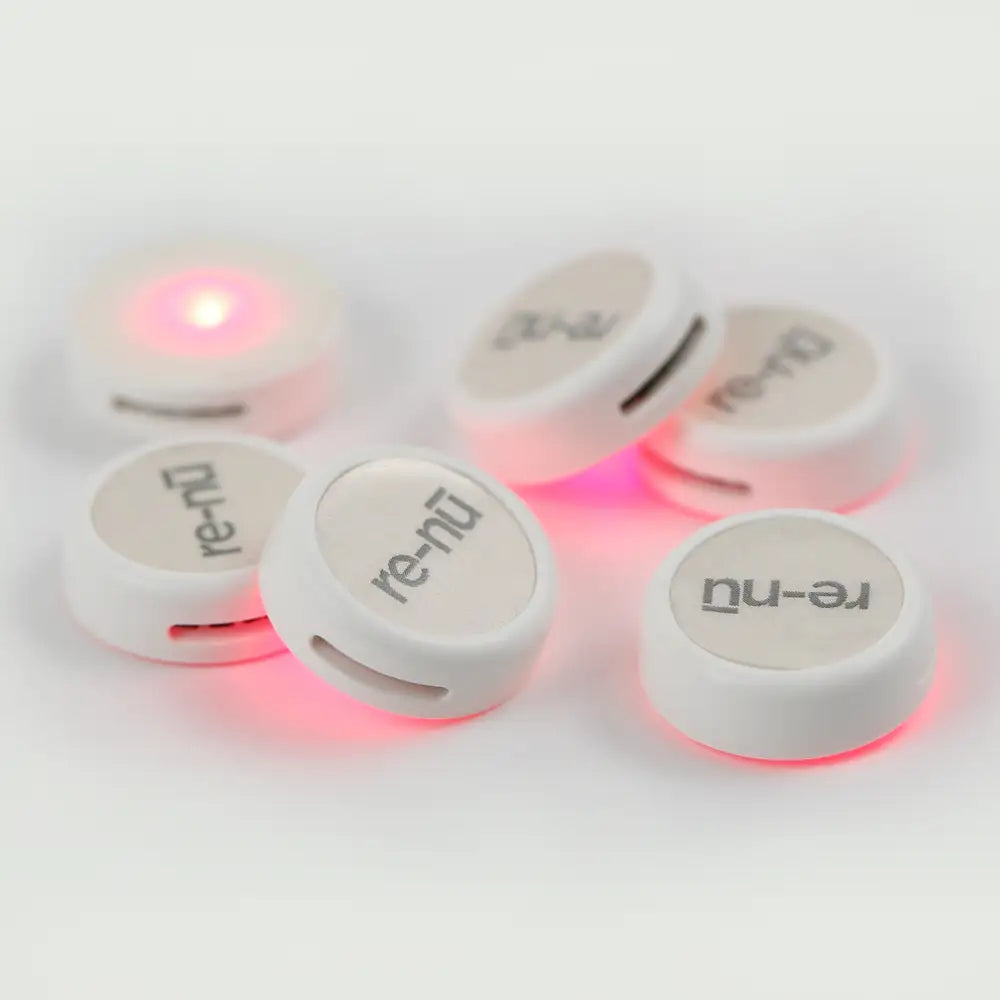 Set of six re-nu Smart LED Patches, illuminating from the powerful Red LED adhesive base.