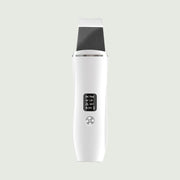 White Ultrasonic Skin Scrubber with stainless steel spatula head and LED display, designed for deep pore cleansing and facial exfoliation.