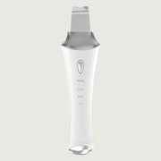 Front view of the Ultrasonic Skin Scrubber with UV Base, a sleek waterproof skincare device designed for deep cleansing, exfoliation, and wireless UV charging.