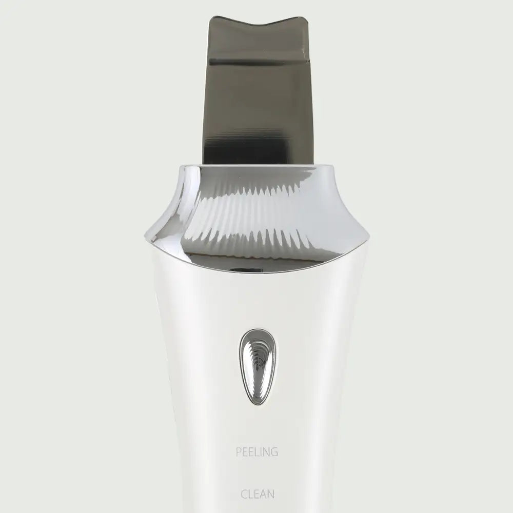 Close-up of the Ultrasonic Skin Scrubber with UV Base, a sleek waterproof skincare device designed for deep cleansing, exfoliation, and wireless UV charging.