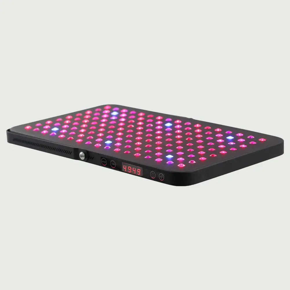 Flat view of the LED Red Light Therapy Panel Elite – UltraThin, fully lit with red, near-infrared and blue LEDs in all modes, highlighting its easy to read display and showcasing its slim, modern design.